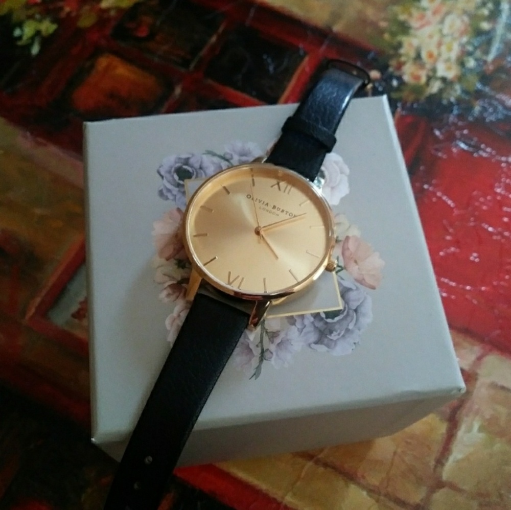 Olivia Burton black leather gold face womens watch